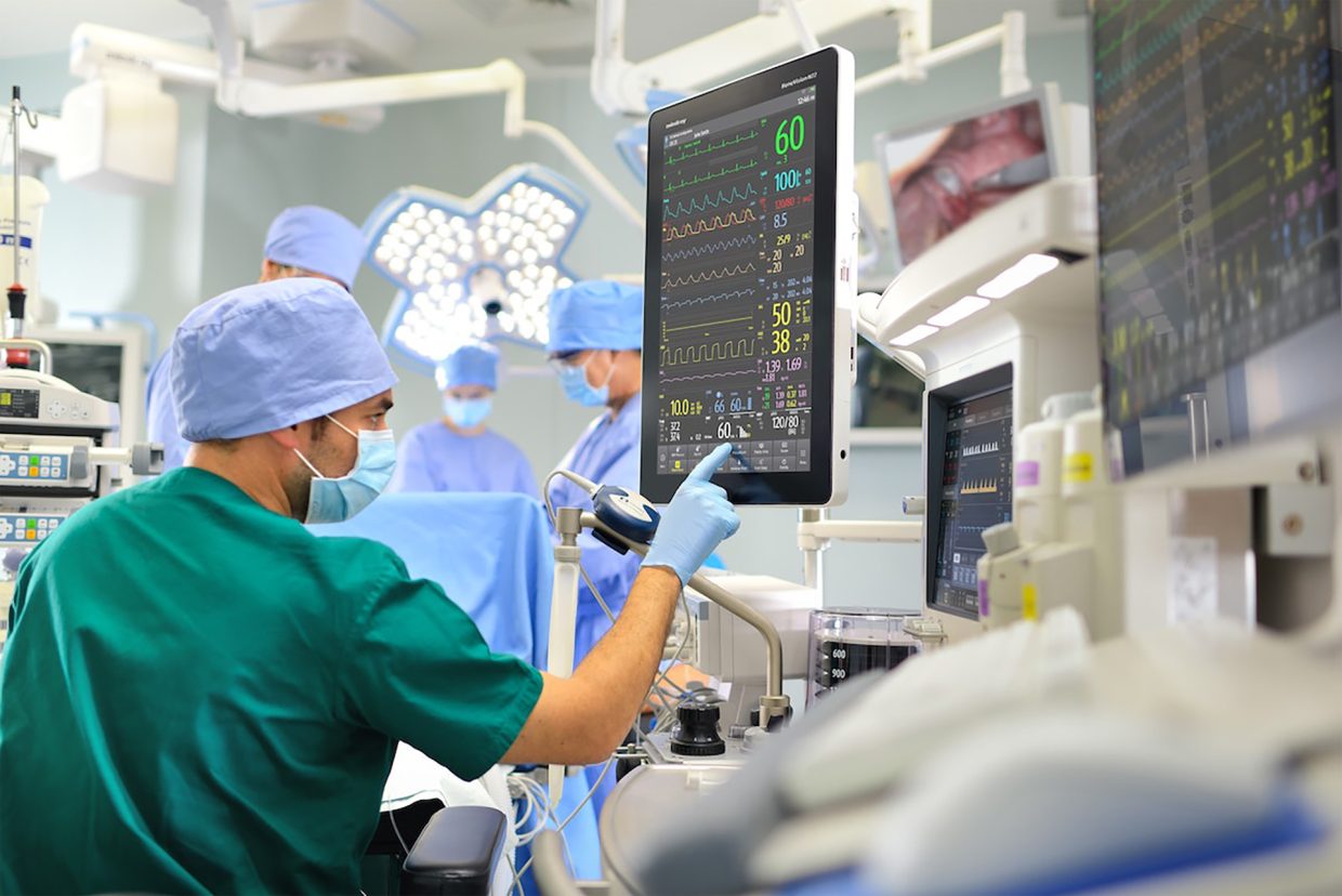 Surgeon working in theatre on a more resilient healthcare system