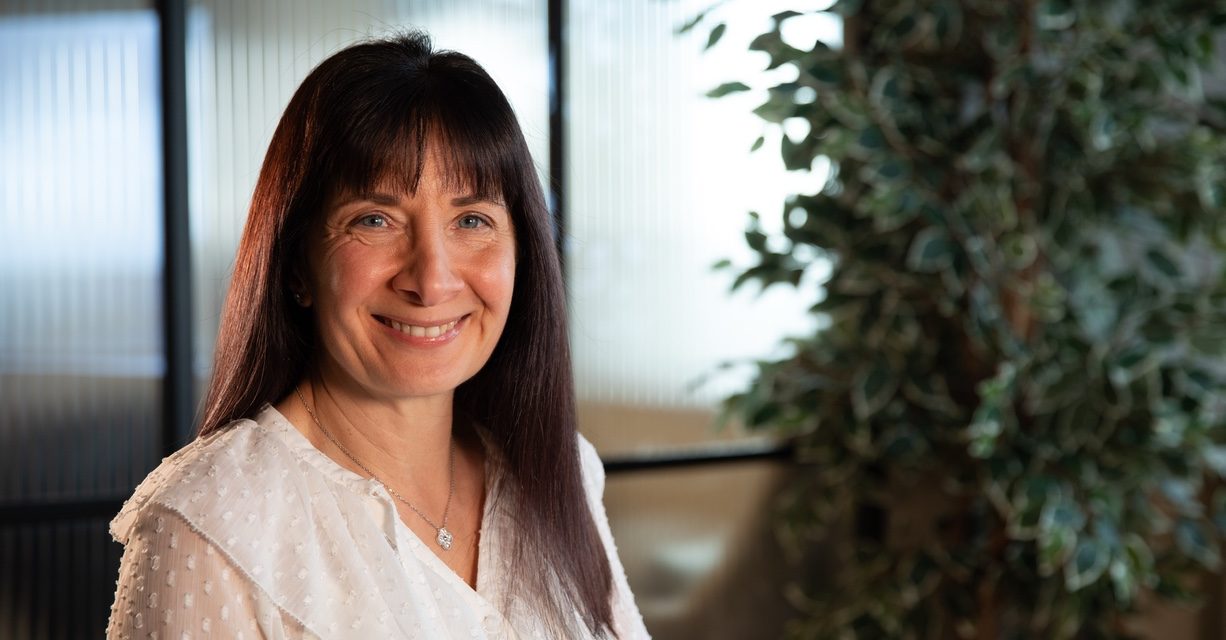 CEO Eman Al-Hillawi smiles at the camera